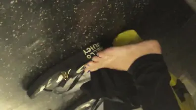 Candid feet on train